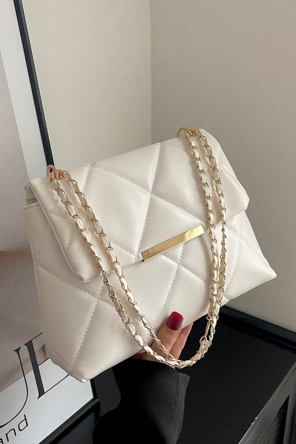 Borsa da donna a quadri con patta