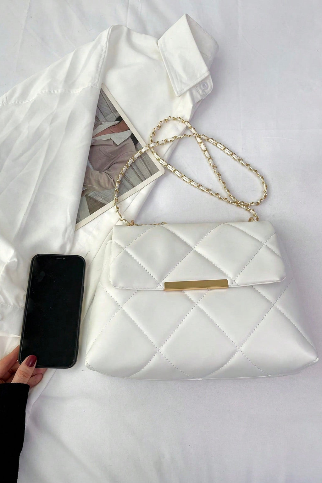 Borsa da donna a quadri con patta