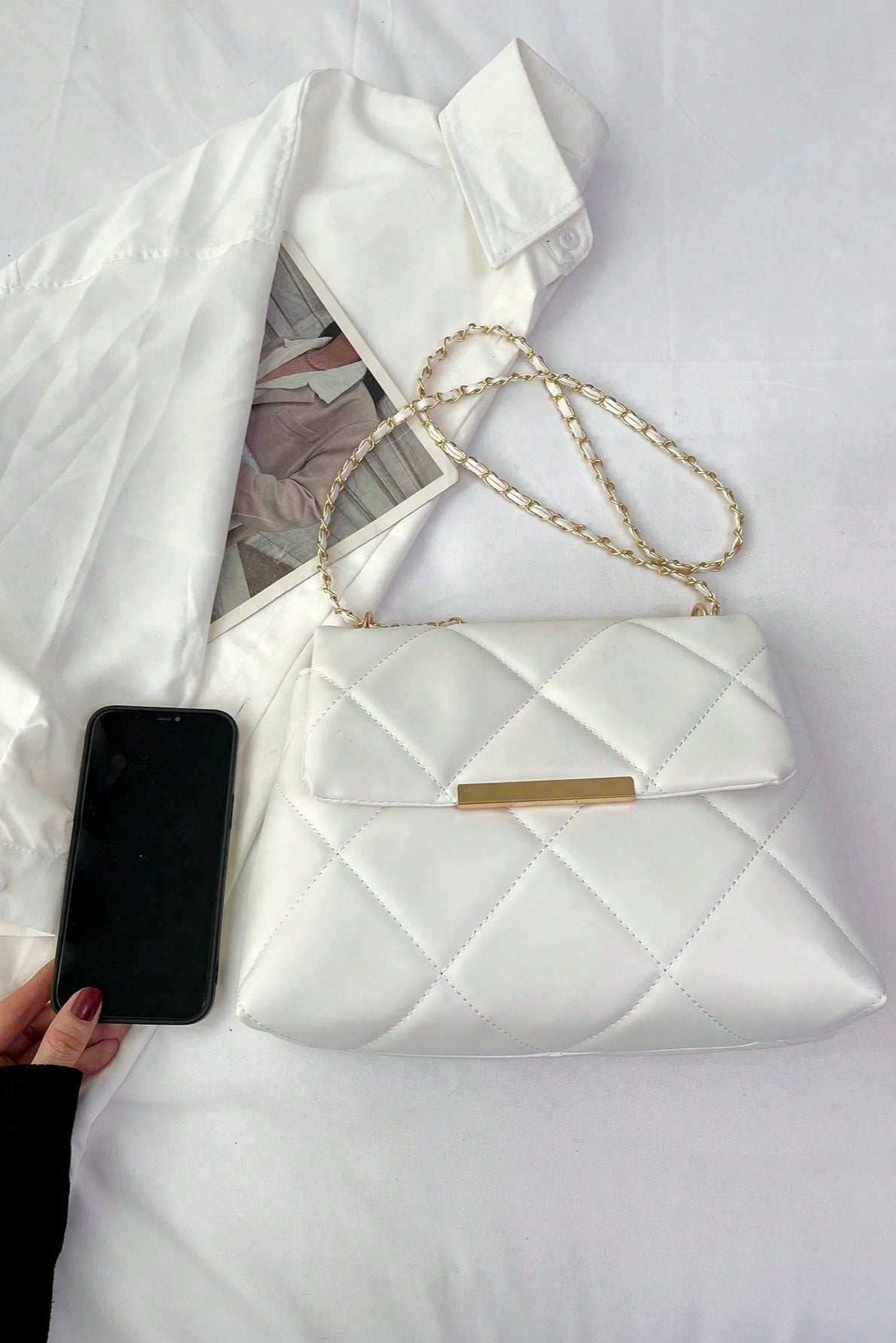 Borsa da donna a quadri con patta