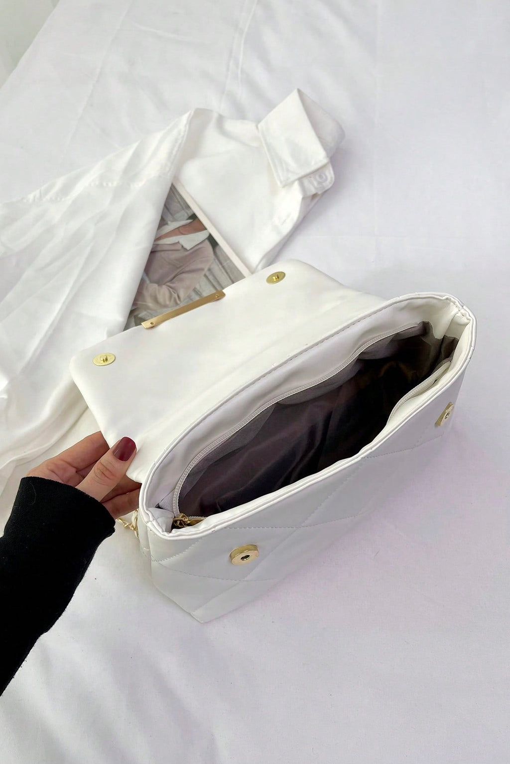 Borsa da donna a quadri con patta