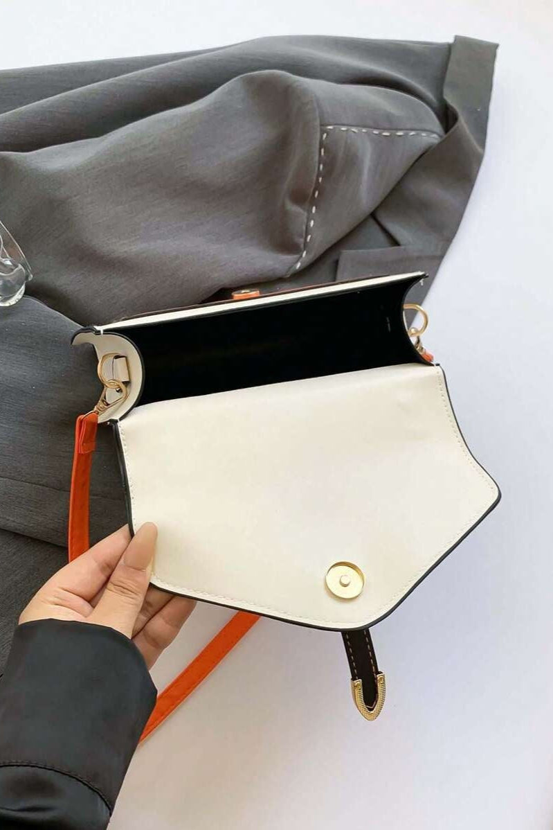 Borsa a tracolla con chiusura a fibbia