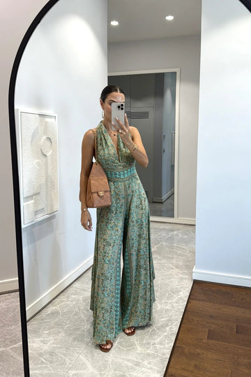 Tuta stampata con scollo sulla schiena