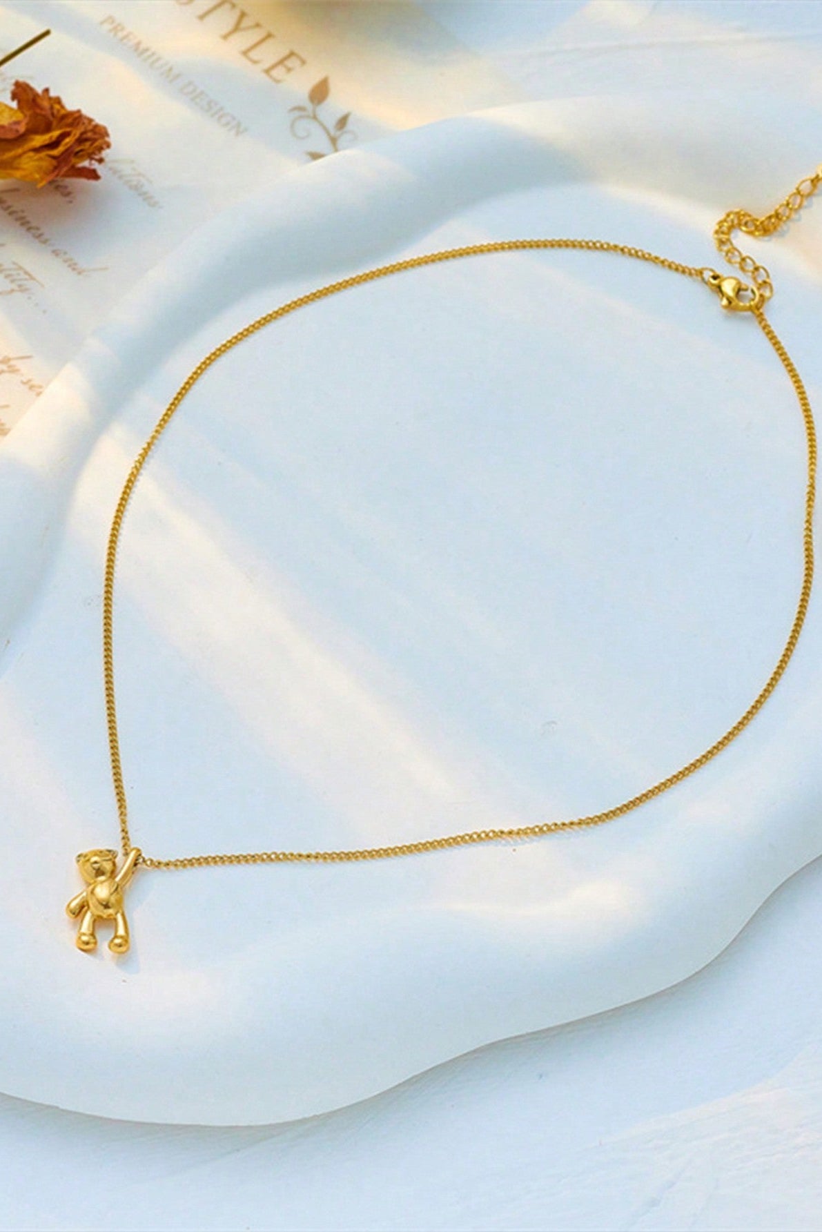 Collana con ciondolo a forma di orsetto