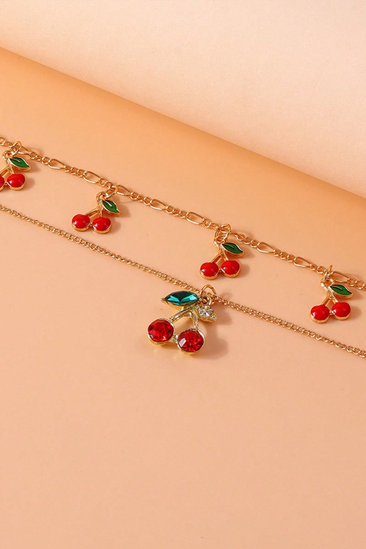 Collana ciliegia multistrato con catena inossidabile