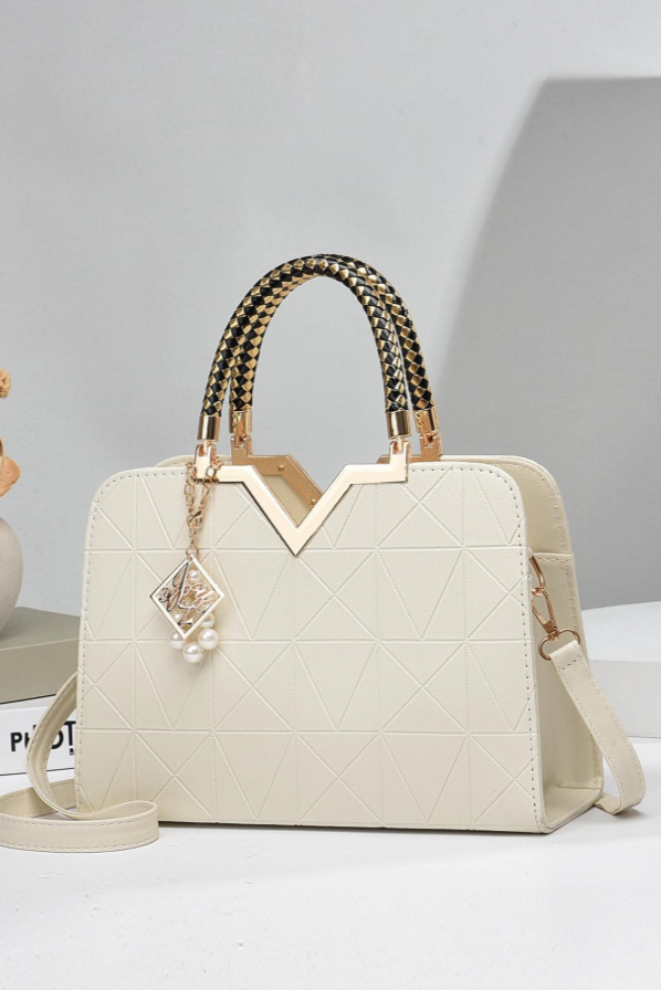 Borsa a tracolla con motivo geometrico