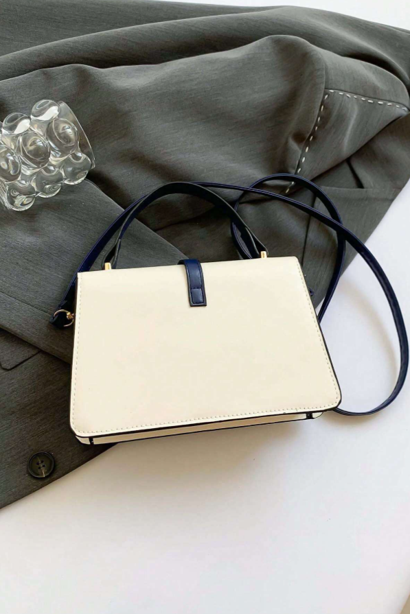 Borsa a tracolla con chiusura a fibbia