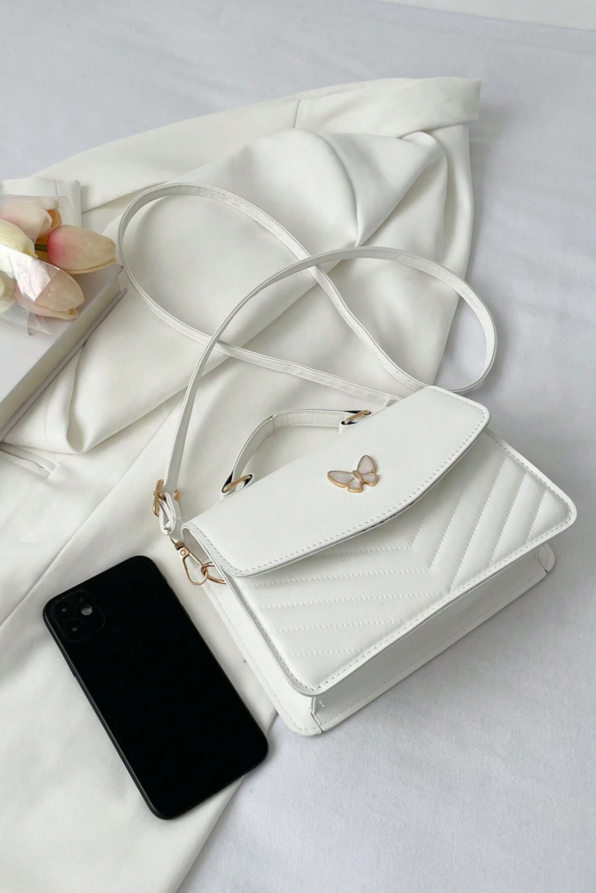 Borsa piccola con motivo farfalle