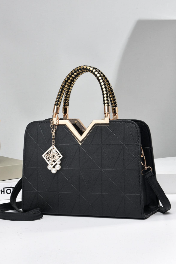 Borsa a tracolla con motivo geometrico