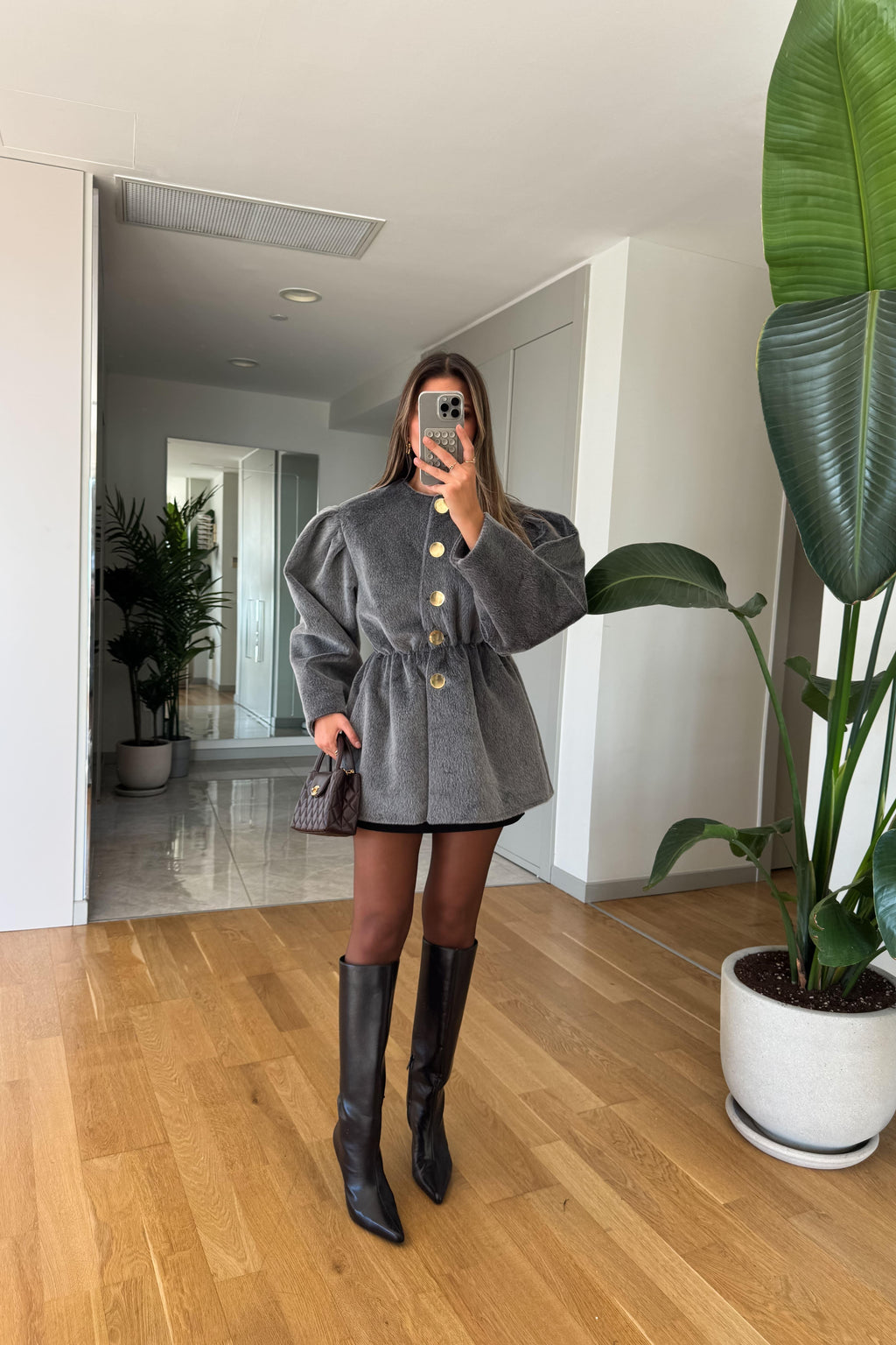 Giacca in pelliccia con elastico in vita