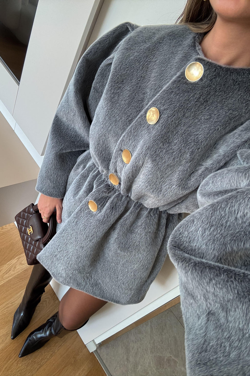 Giacca in pelliccia con elastico in vita