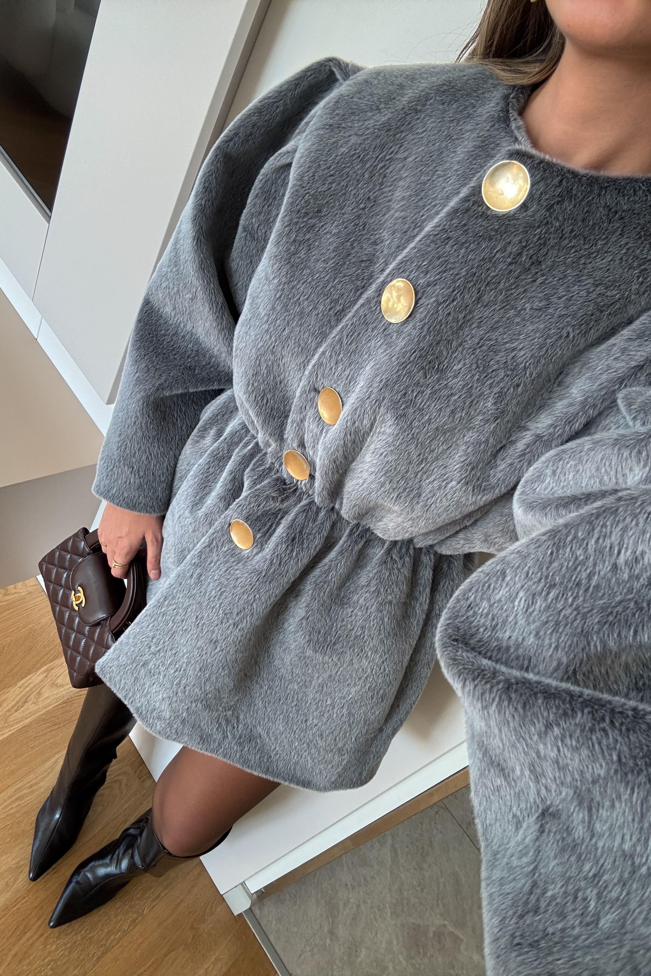 Giacca in pelliccia con elastico in vita