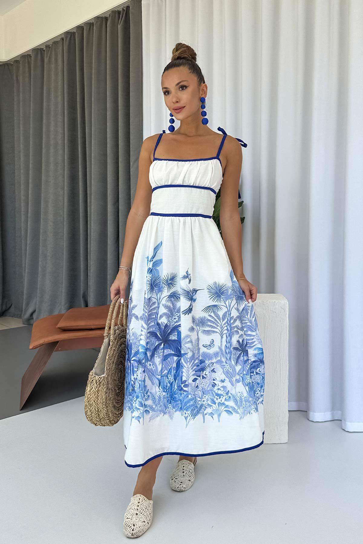 Abito con scollo quadrato e orlo decorato