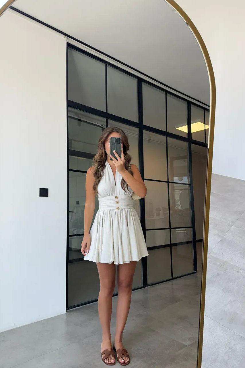 Vestido de lino con botones y lazada al cuello