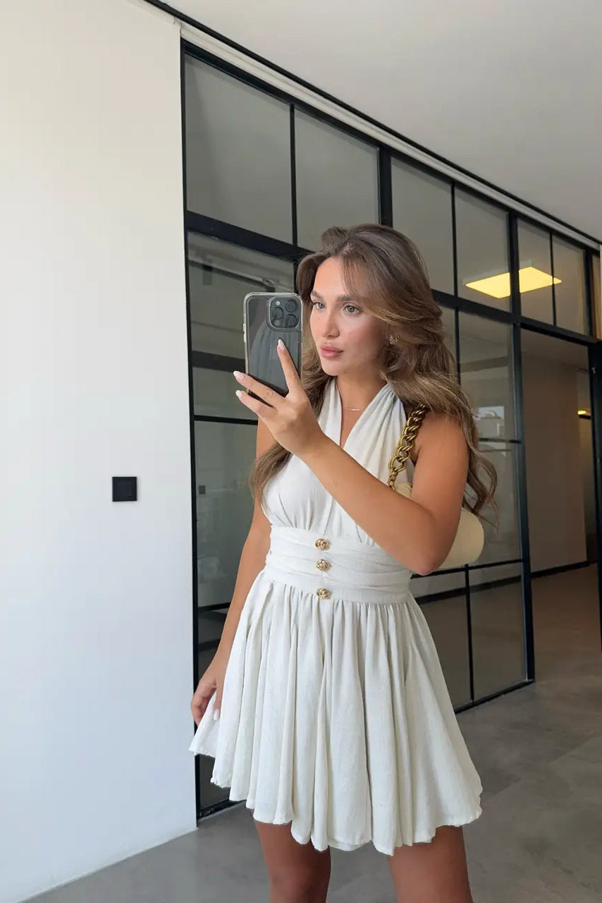 Vestido de lino con botones y lazada al cuello