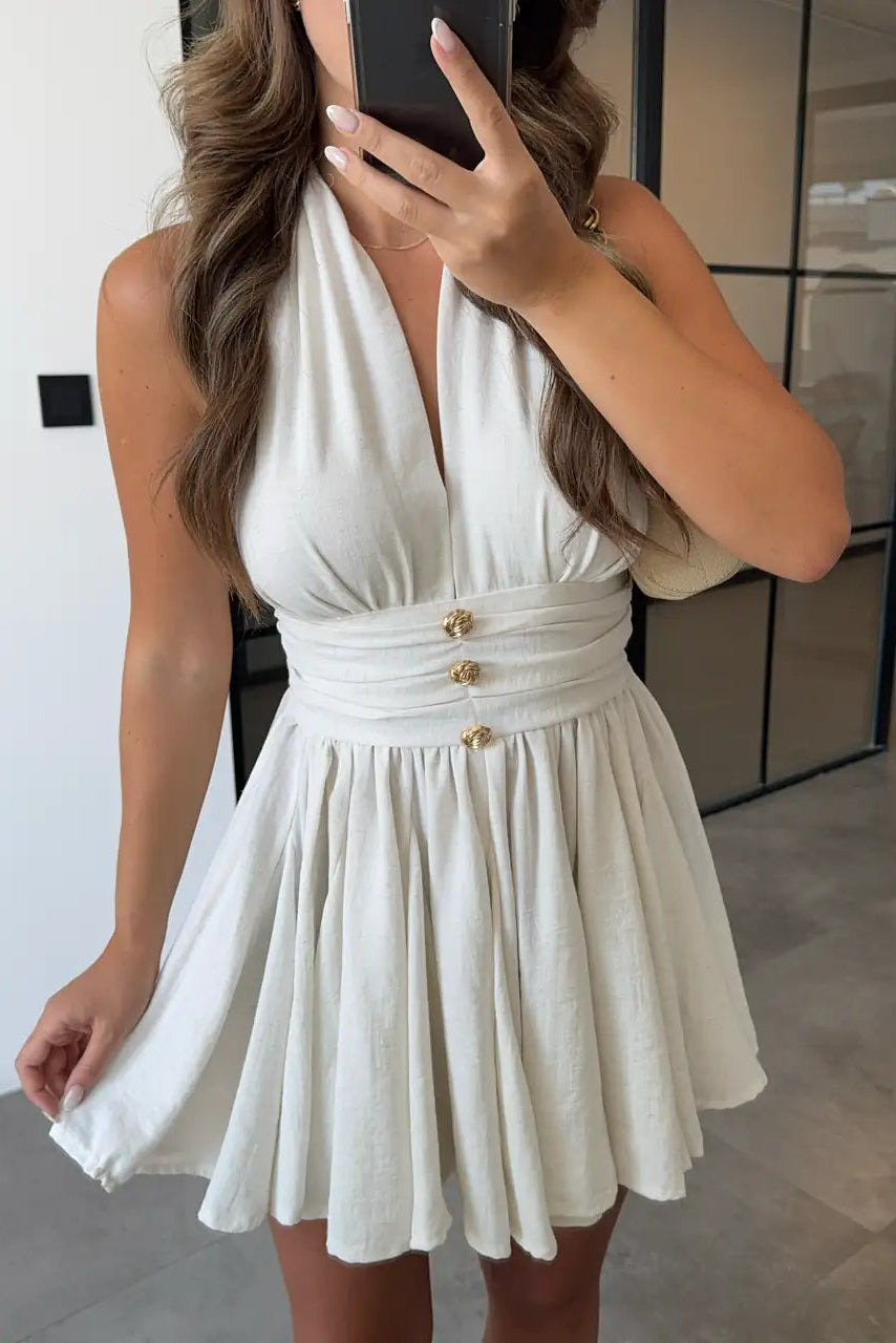 Vestido de lino con botones y lazada al cuello