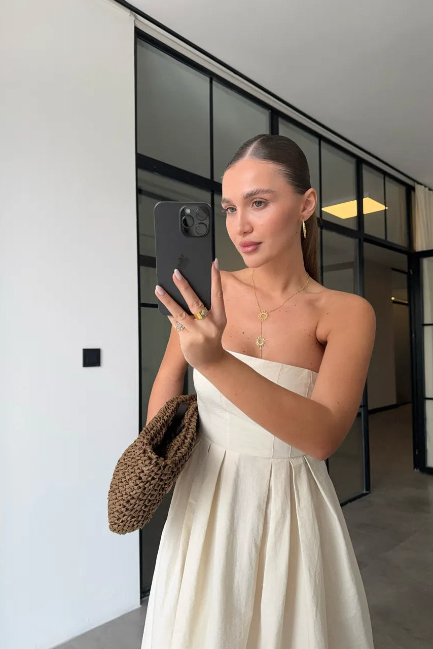 Vestido sin tirantes con bolsillos en tejido tipo paracaídas