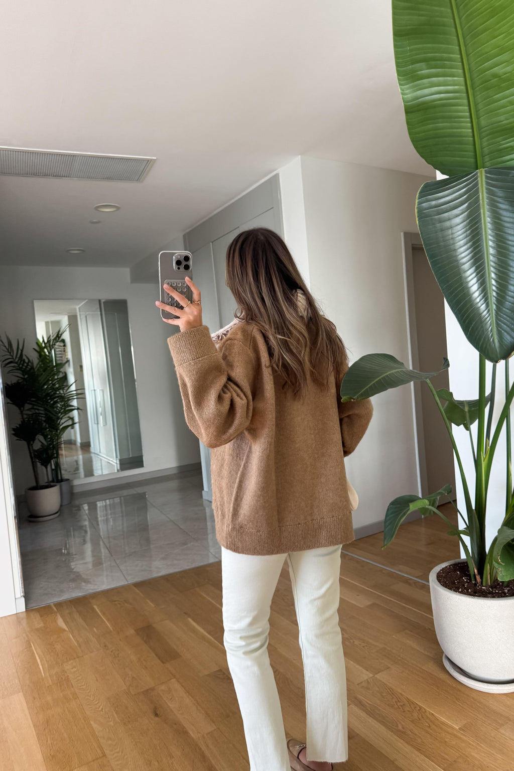 Cardigan con collo in pelliccia e zip