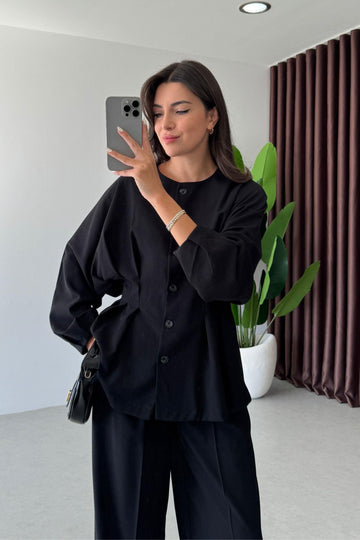 Completo blusa e pantaloni, schiena elasticizzata