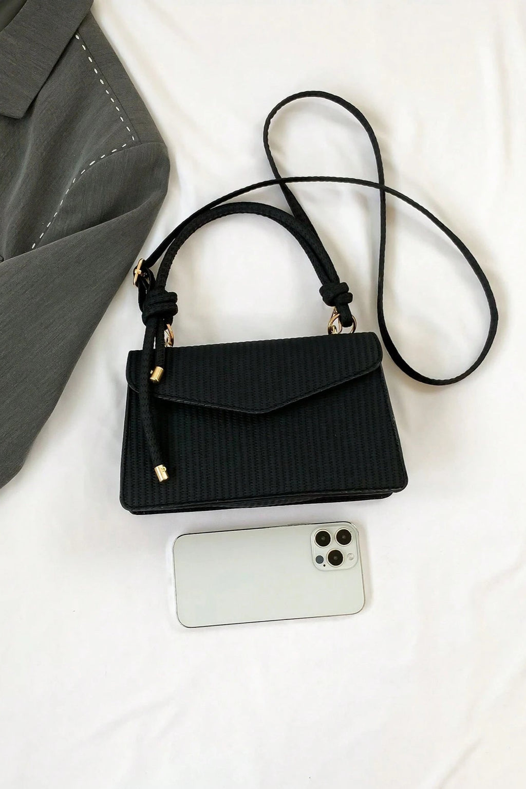 Mini borsa a mano e a tracolla con patta