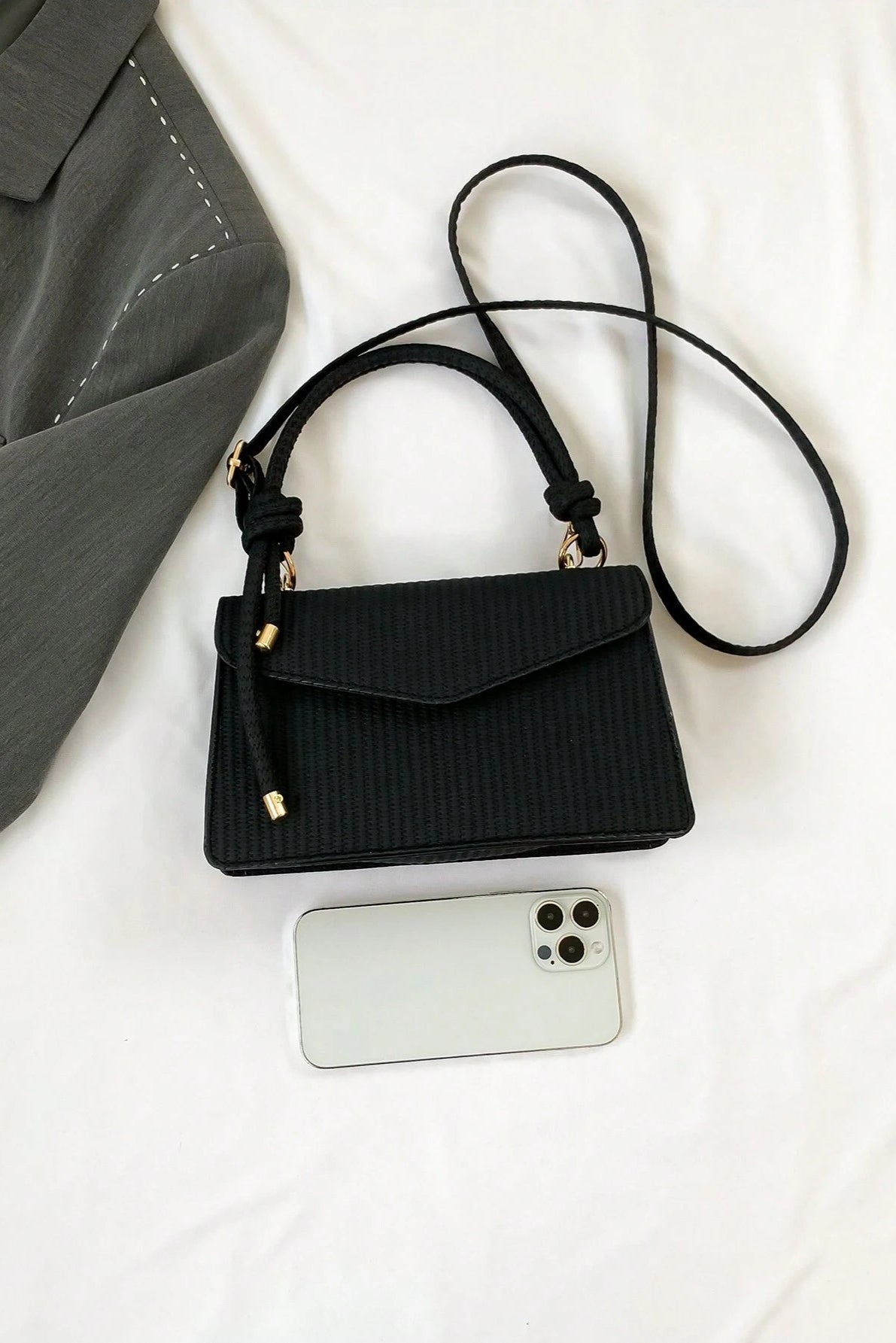 Mini borsa a mano e a tracolla con patta