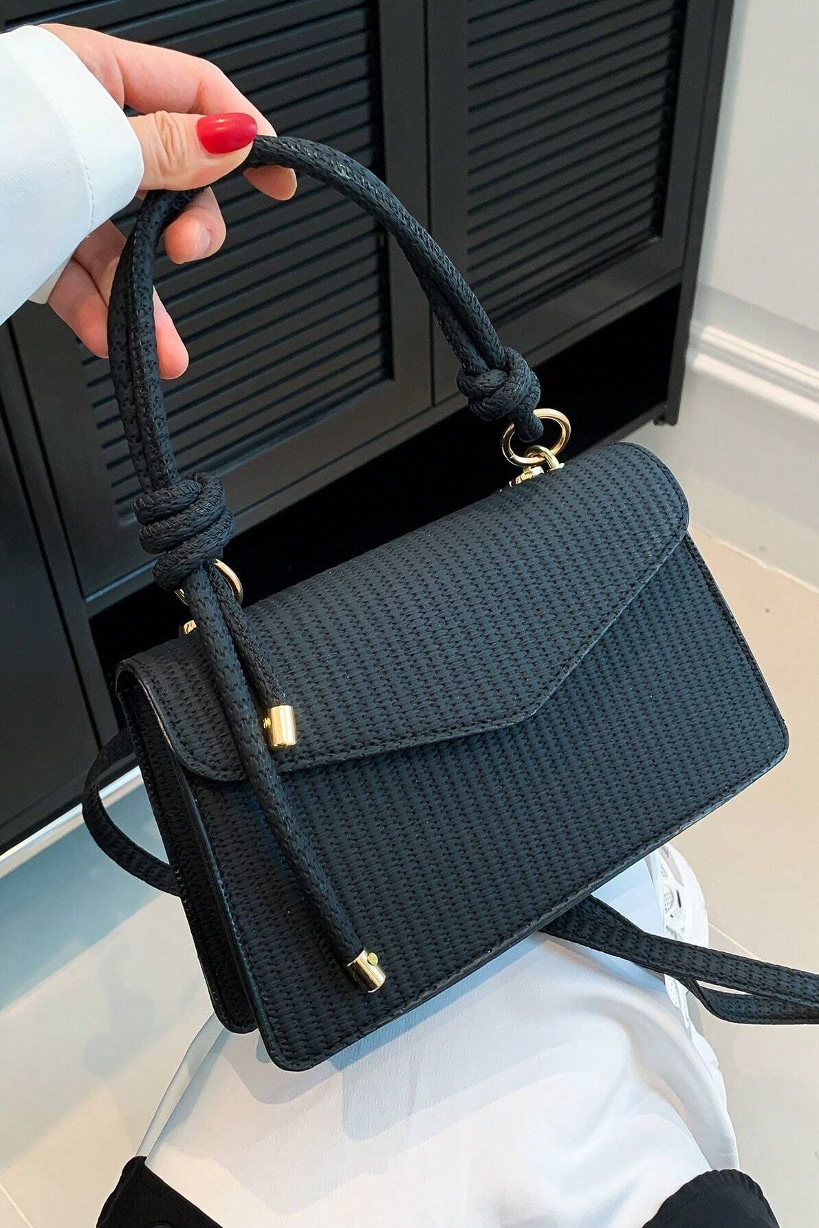 Mini borsa a mano e a tracolla con patta