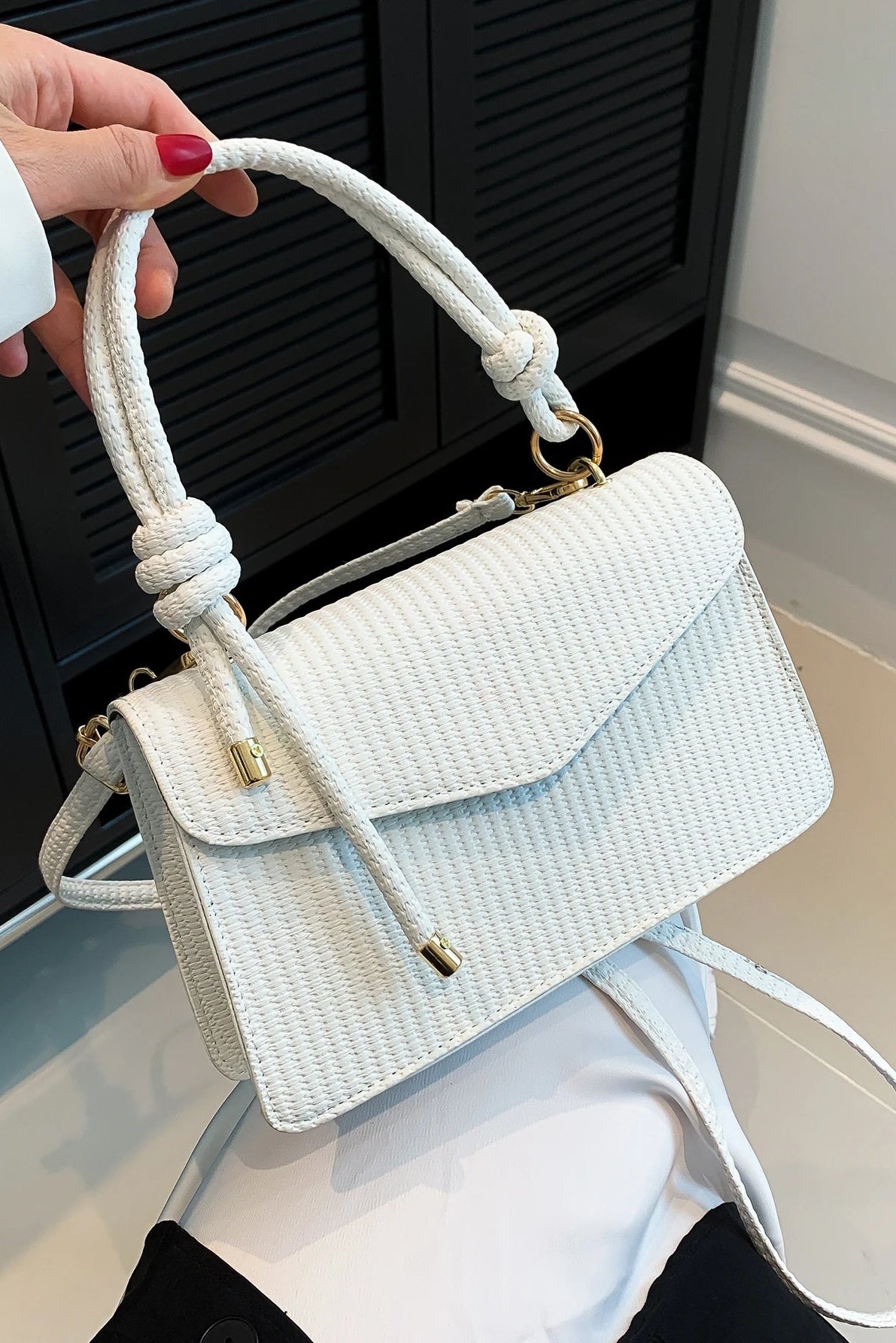 Mini borsa a mano e a tracolla con patta