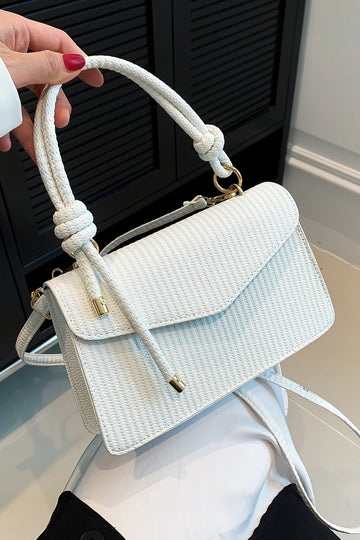 Mini borsa a mano e a tracolla con patta