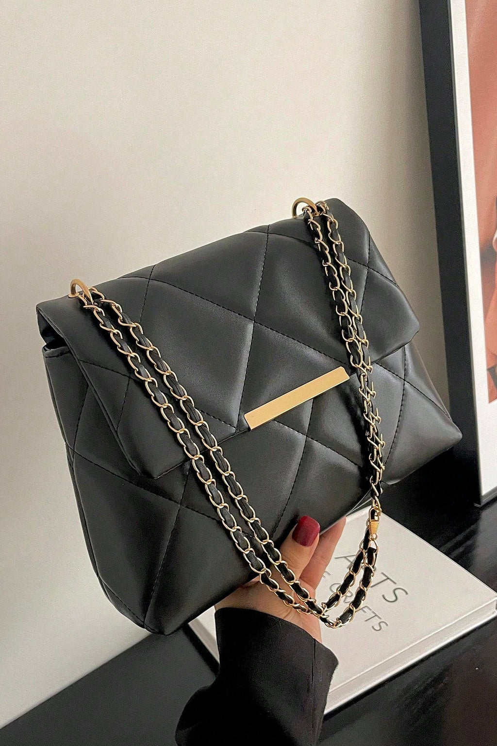 Borsa da donna a quadri con patta