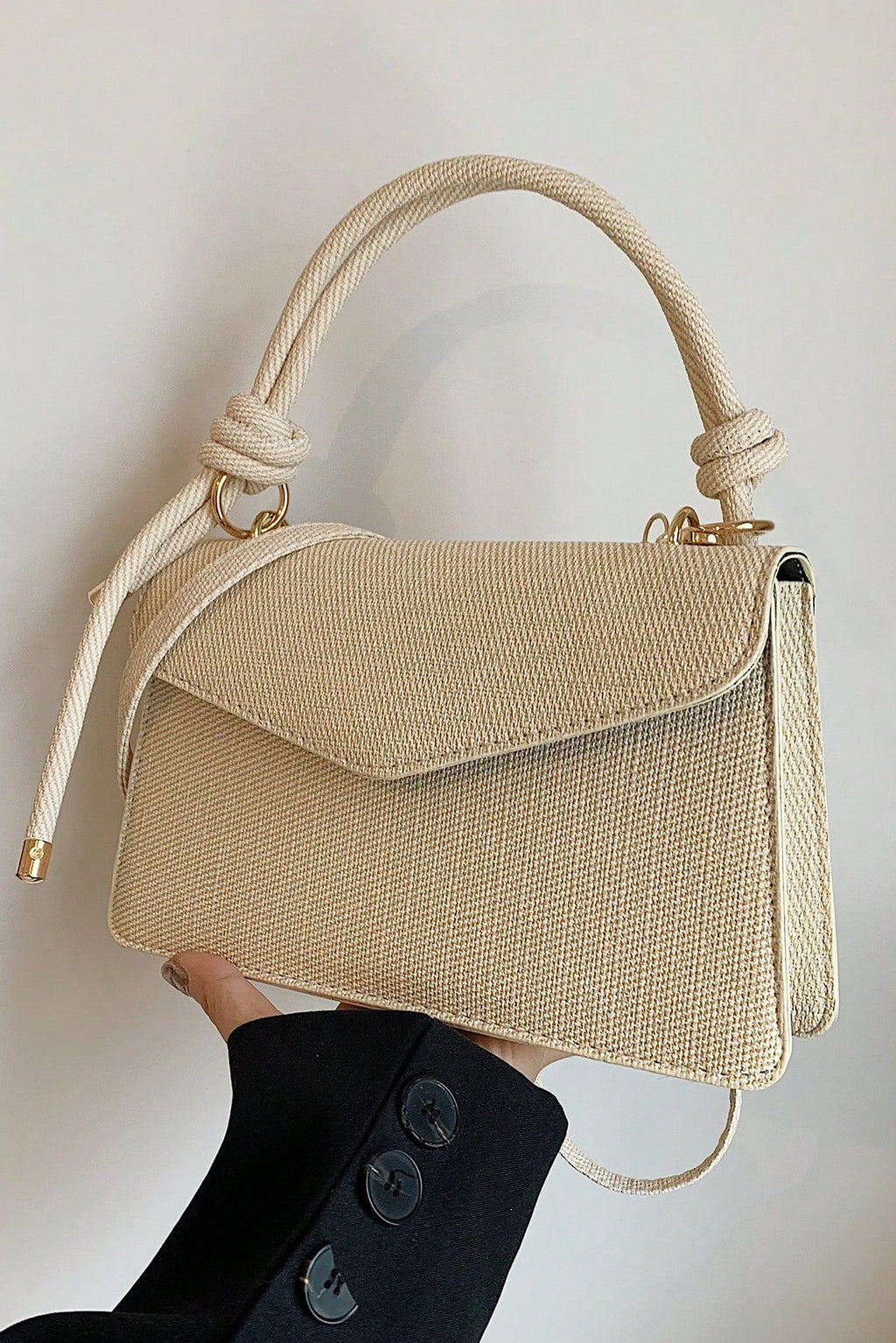 Mini borsa a mano e a tracolla con patta