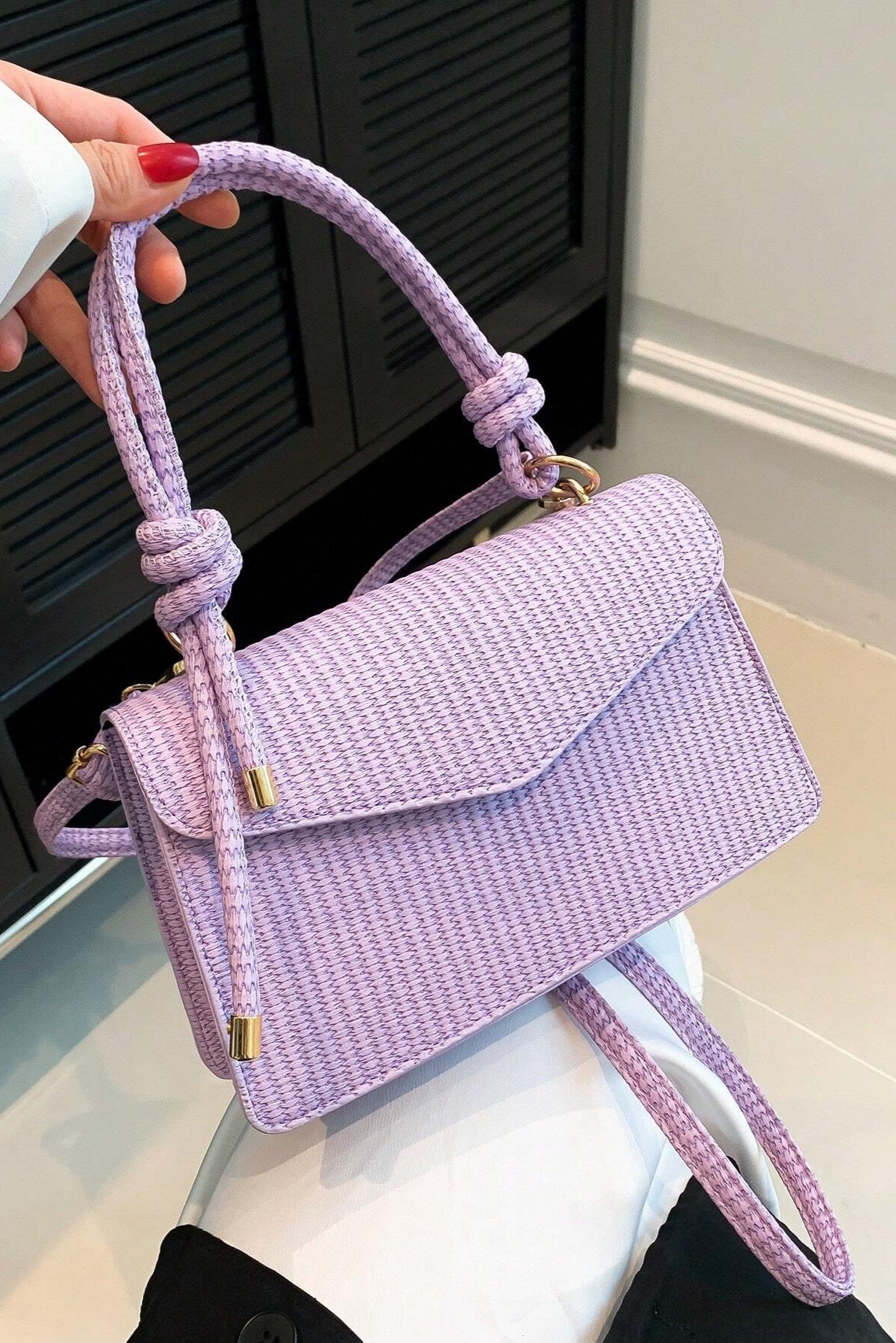 Mini borsa a mano e a tracolla con patta