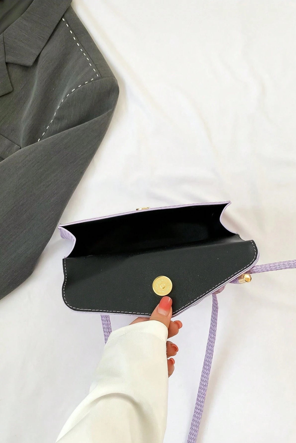 Mini borsa a mano e a tracolla con patta