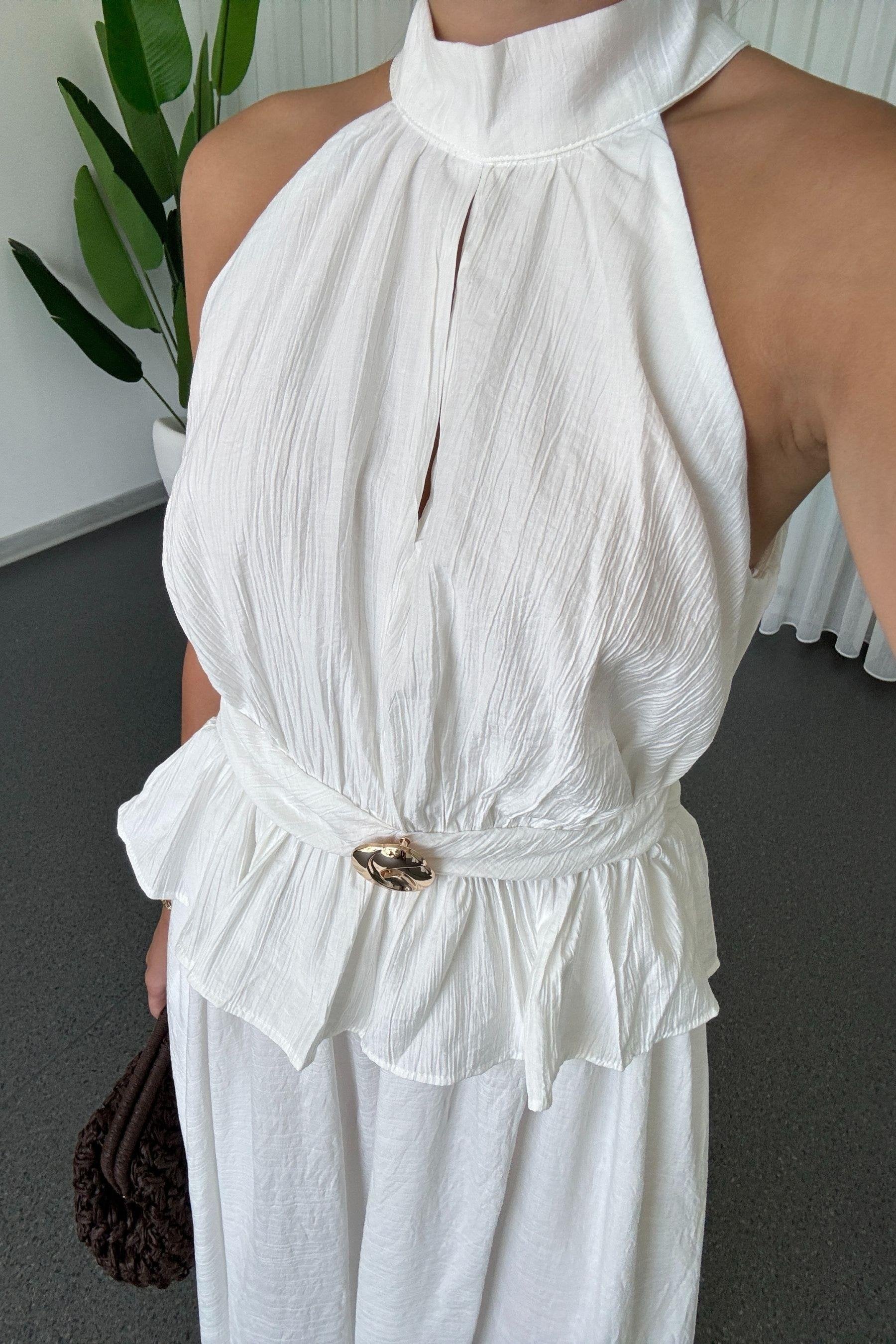 Conjunto de falda y blusa con detalle de clip