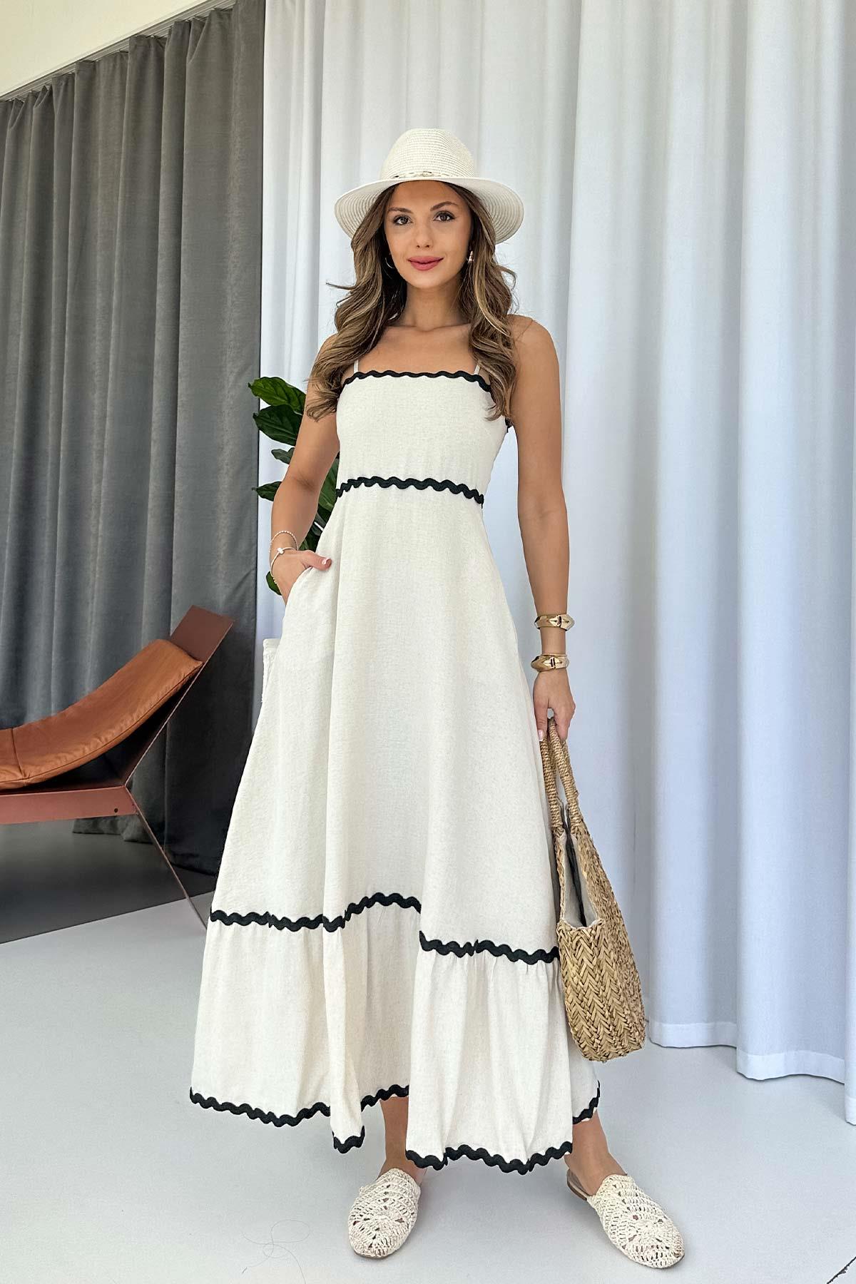 Abito elegante con scollo dritto e onde